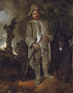 An old peasant with a donkey in a wooded landscape